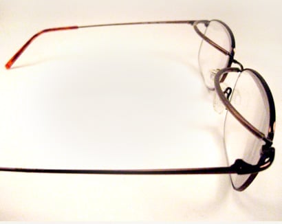 Eyeglass modification with crutches to support Ptosis patients